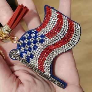 U.S.A.  Flag red white blue rhinestones keychain Goldtone red tassel patriotic